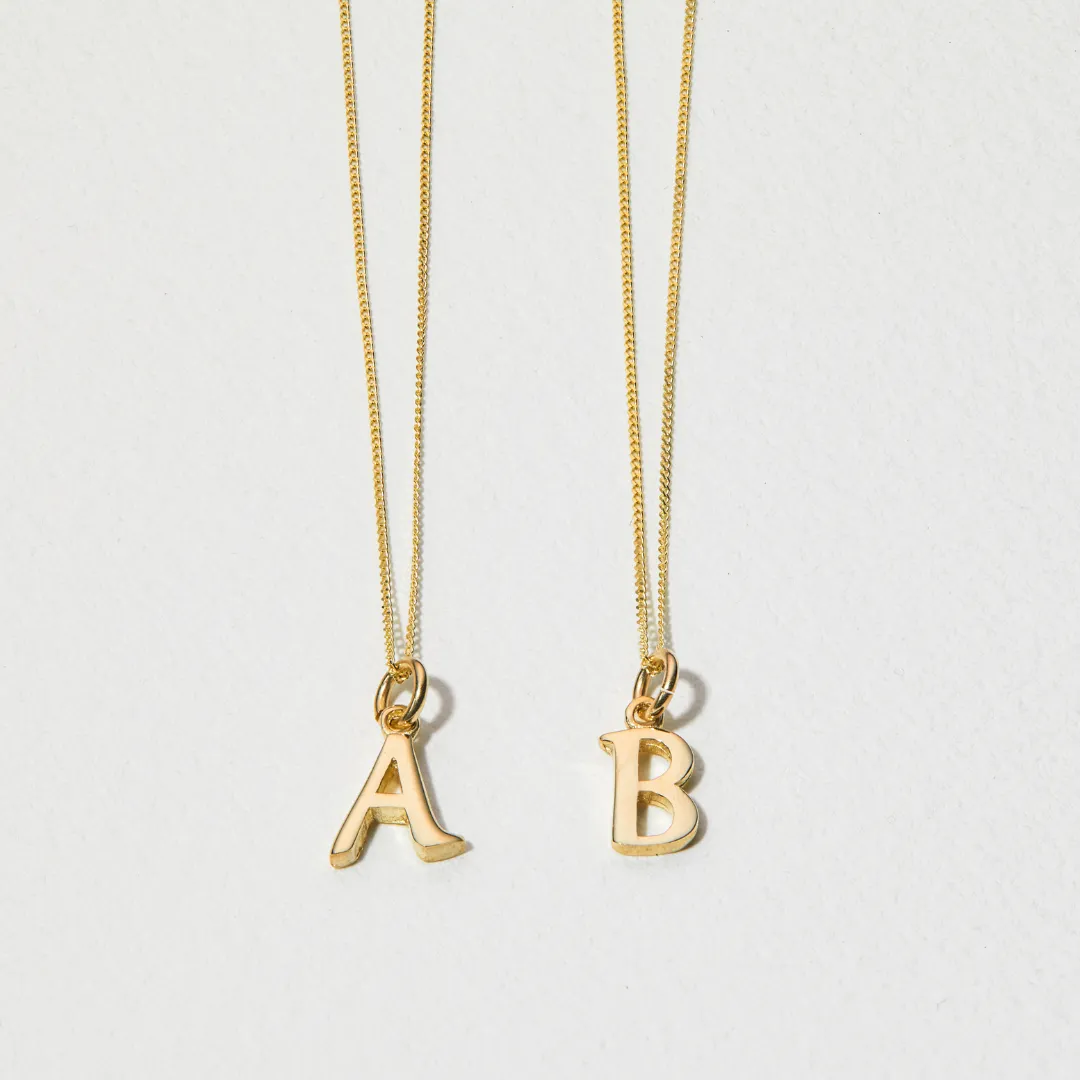 Solid Gold Curve Initial Letter Necklace