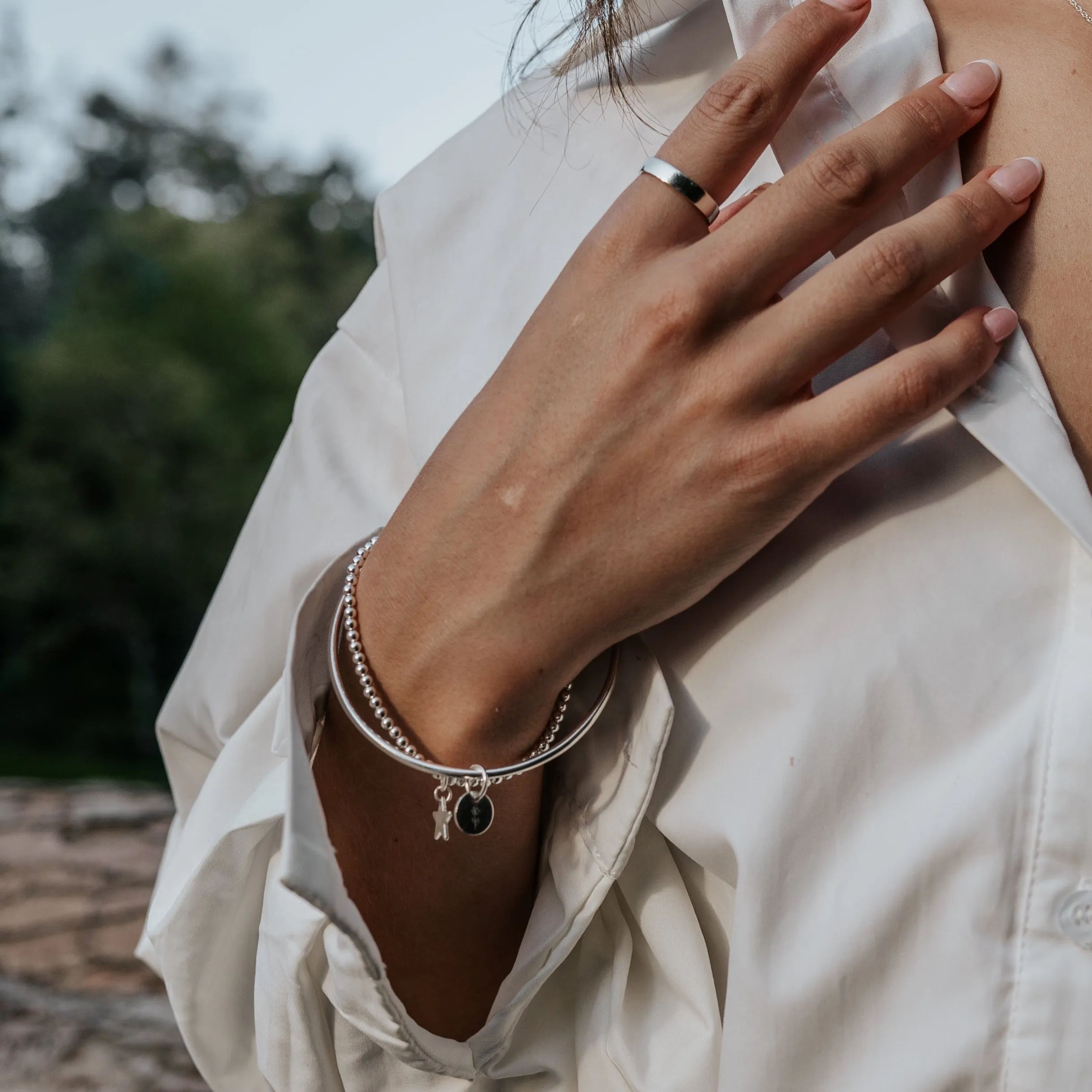 Sterling Silver Dove Charm Bangle